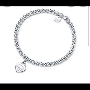 Tiffany and Co. sterling silver small ball tennis bracelet